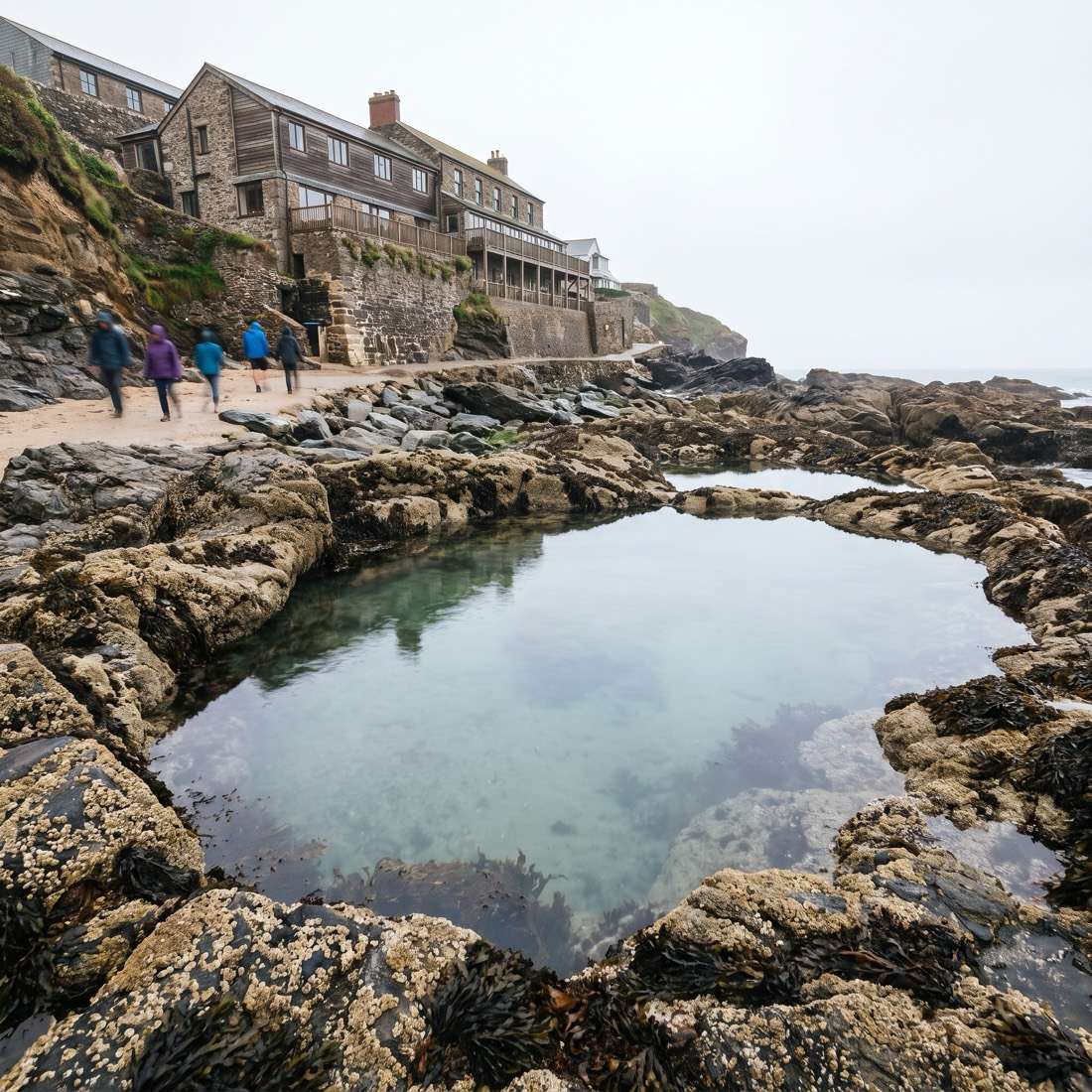 A natural rock tidal pool below the hotel